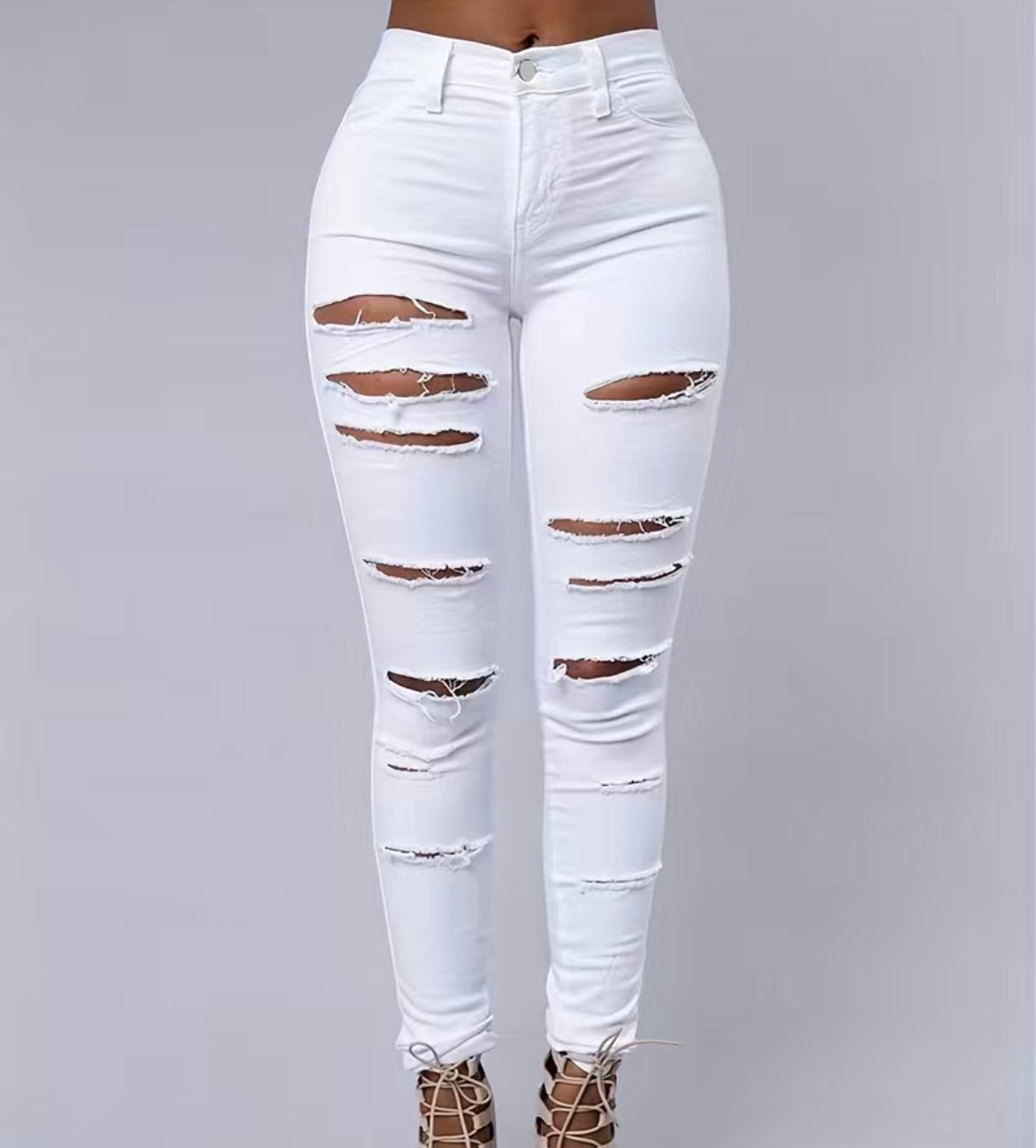 White cut up jeans