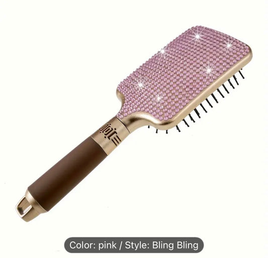 Pink rhinestone paddle brush