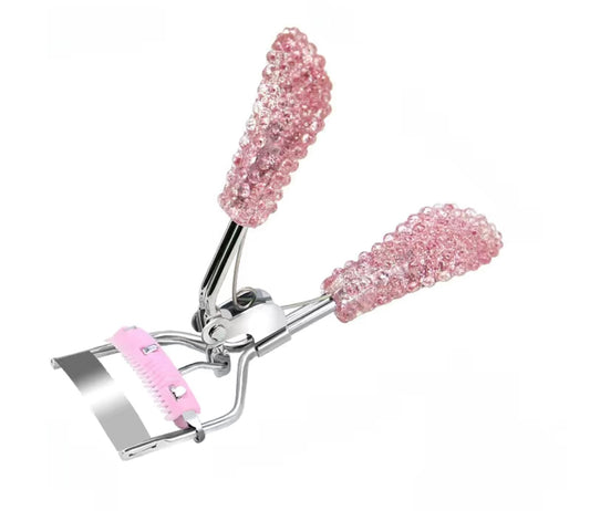 Pink sparkly lash curler